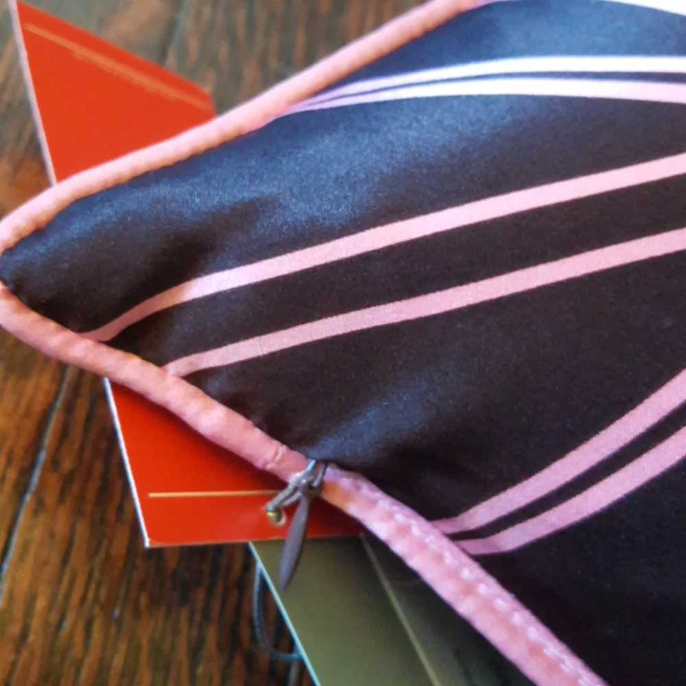 Plush Living Crest Nook Pillow NWT brown and pink graphic